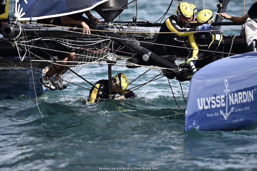 America's Cup Artemis crew making repairs.