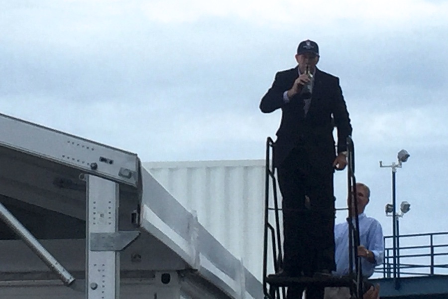 ... and then takes the ceremonial swig from the bottle. 