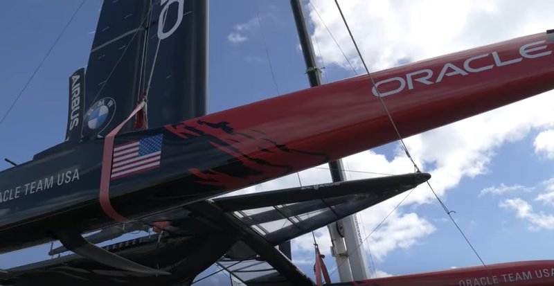 America's Cup Class race boat. Note the long winglet on the daggerboard .